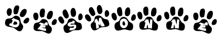 The image shows a row of animal paw prints, each containing a letter. The letters spell out the word Desmonne within the paw prints.