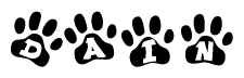 The image shows a series of animal paw prints arranged in a horizontal line. Each paw print contains a letter, and together they spell out the word Dain.