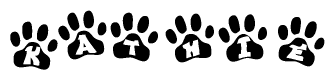 The image shows a series of animal paw prints arranged in a horizontal line. Each paw print contains a letter, and together they spell out the word Kathie.