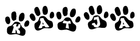 The image shows a row of animal paw prints, each containing a letter. The letters spell out the word Katja within the paw prints.