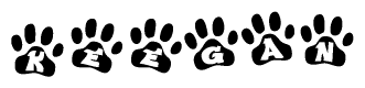 The image shows a series of animal paw prints arranged in a horizontal line. Each paw print contains a letter, and together they spell out the word Keegan.