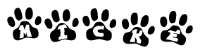 The image shows a series of animal paw prints arranged horizontally. Within each paw print, there's a letter; together they spell Micke