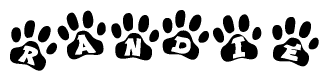 The image shows a series of animal paw prints arranged in a horizontal line. Each paw print contains a letter, and together they spell out the word Randie.