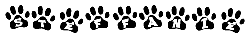 The image shows a series of animal paw prints arranged horizontally. Within each paw print, there's a letter; together they spell Steffanie
