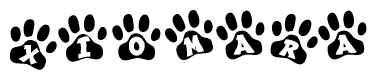 The image shows a series of animal paw prints arranged in a horizontal line. Each paw print contains a letter, and together they spell out the word Xiomara.
