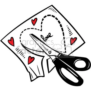 scissors cutting a heart out of paper